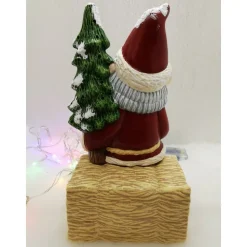 Weihnachtswichtel auf Strohballen